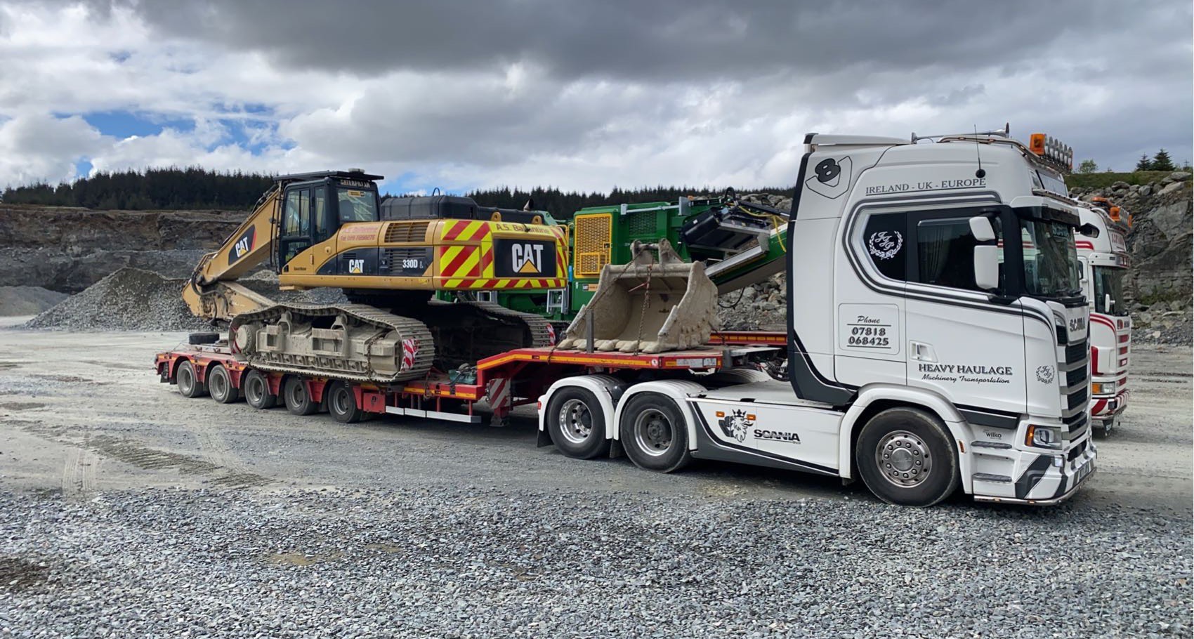 JJP Haulage Ltd Scania Lorry with JCB cargo on the back